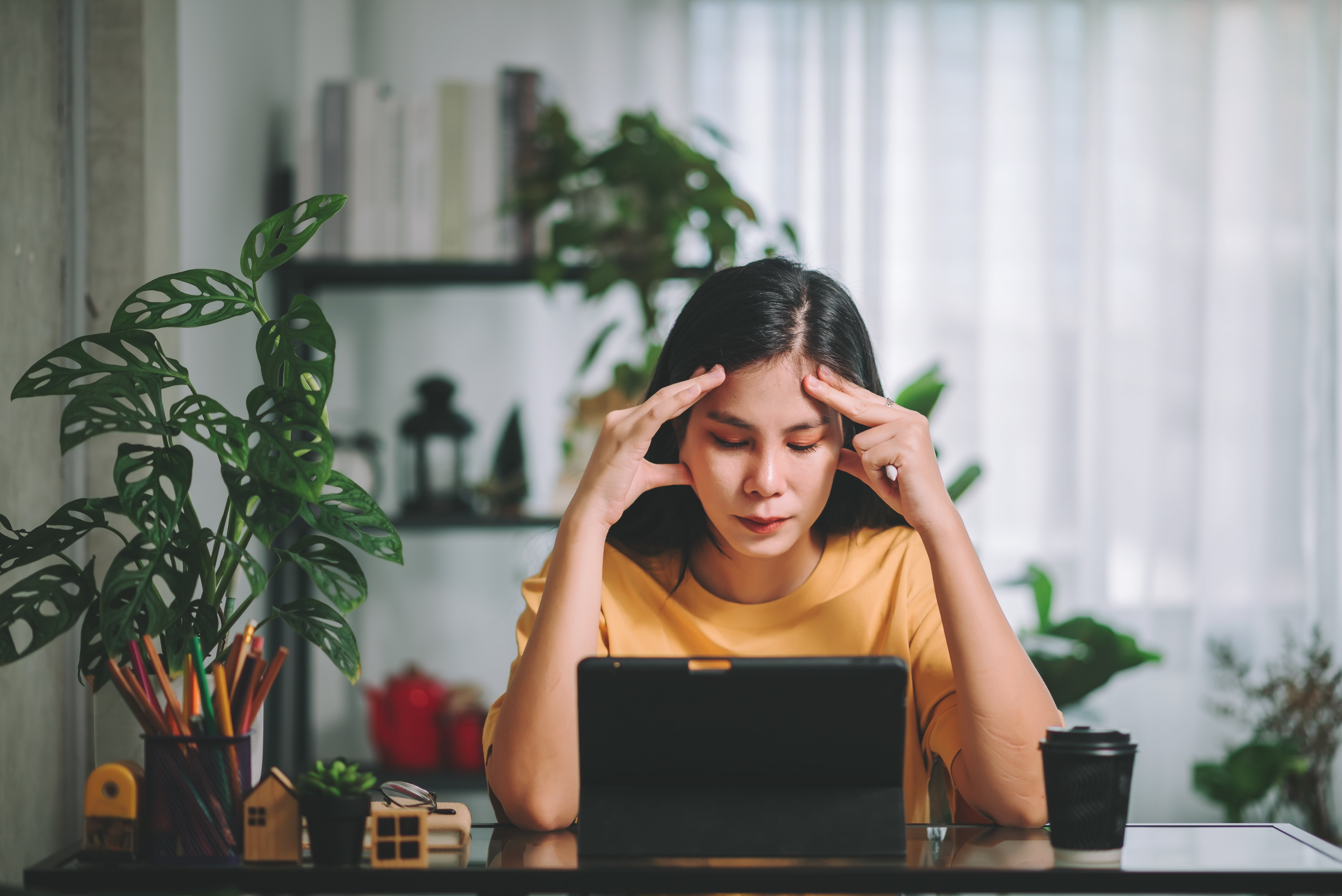 asian-woman-has-a-headache-mental-health-mental-2022-10-31-07-52-53-utc